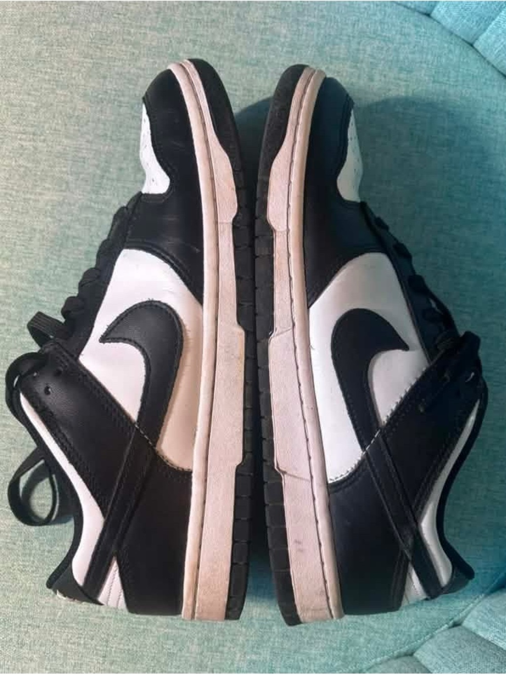 Nike Men’s Black and White Low-Top Sneakers with Iconic Swoosh